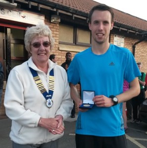 Carl Smith Northern Athletics 5k Champion 2015 with Northern Athletics President Jean Simpson