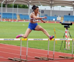 Nisa Desai on route to 400m hurdles vcitory