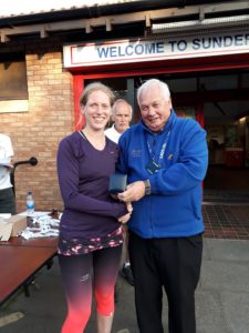 Georgie Campbell 3rd in NA 2017 5k Road Running Championship with past NA President Bill McGuirk