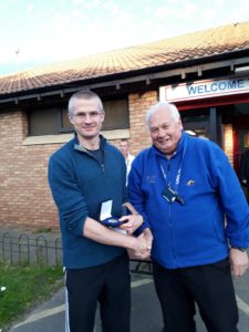 Peter Newton winner of NA 2017 5k Road running Championship with past NA President Bill McGuirk