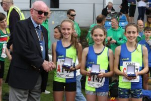 NA President presents Vale Royal U/13 girls with their medals as road relay champs 2017