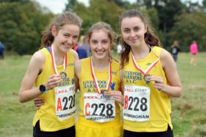 From left to right: Emma Gordon, Ella McNiven and Jessica Cook (Liverpool Harreirs and AC) winners of the womens under-17s 3 stage road relay, 2017