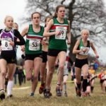 Leaders of the womens junior race, 49 Francesca Brint, eventual winner, 53 Juliet Downs, 51 Claudia Cowen (all Sale Harriers Manchester), and 8 Becky Briggs (City of Hull), 2018 Northern Cross Country Champs., Harewood House, Leeds. Photo: David T. Hewitson/Sports for All Pics