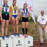 Under 20s women triple jump, 1st Holly Smith, 2nd Rebecca Keen, 3rd Grace Plater with Kevin Carr