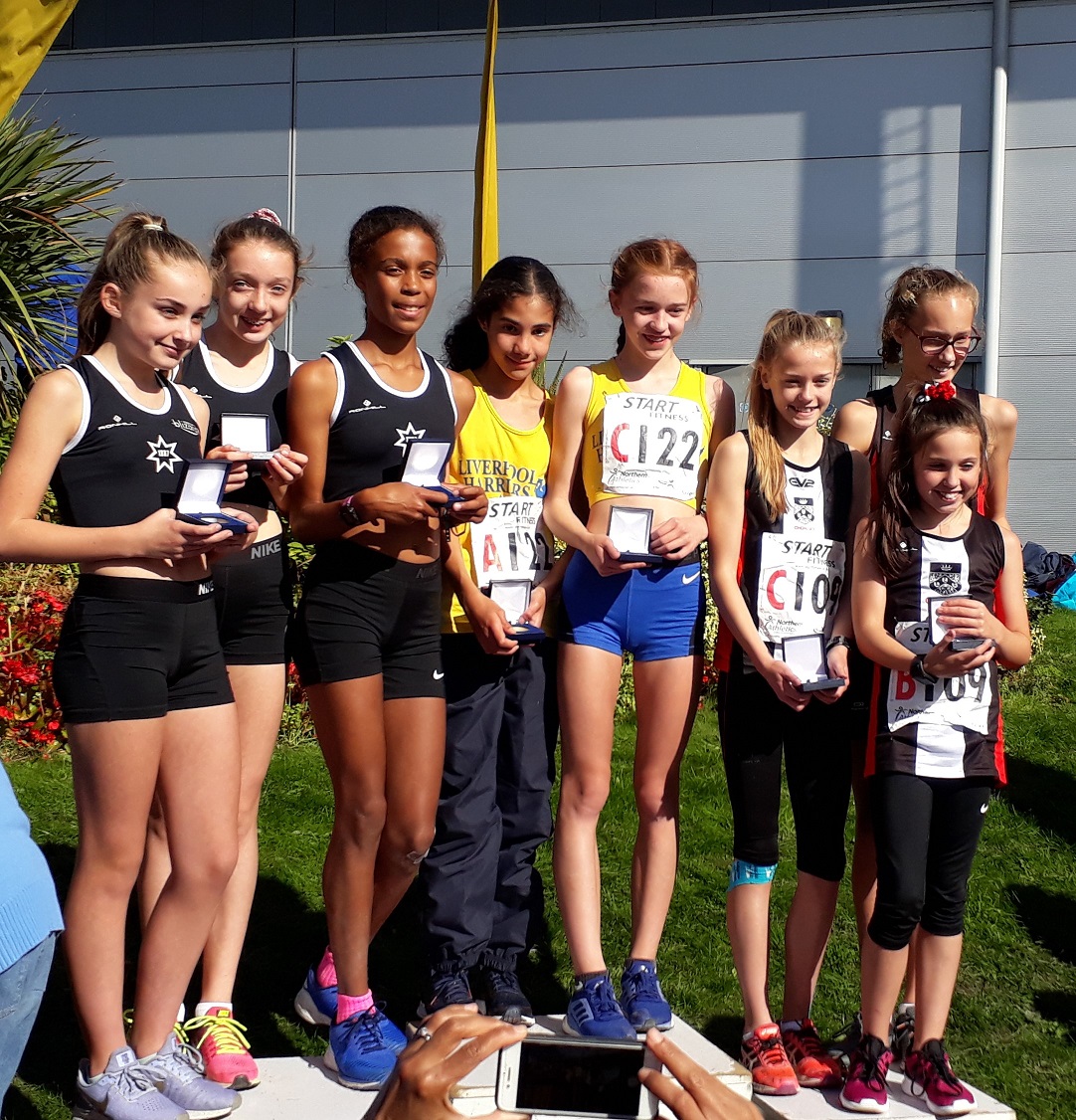 Presentation of under 13 girls medal winners at NA road relays 2018