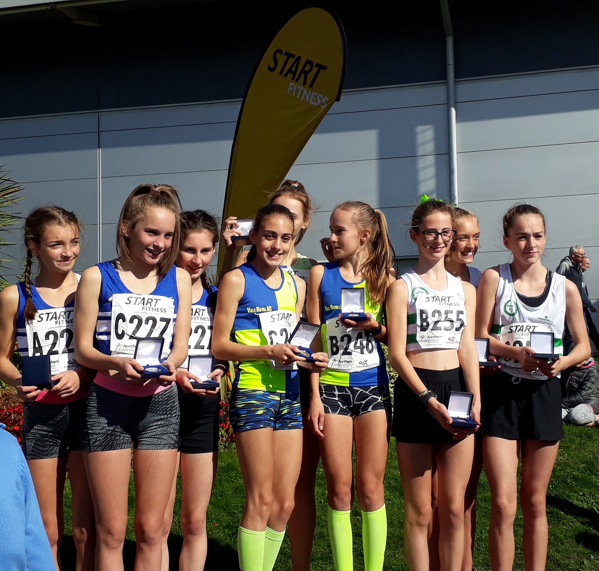 Presentation of under 15 girls medal winners at NA road relays 2018