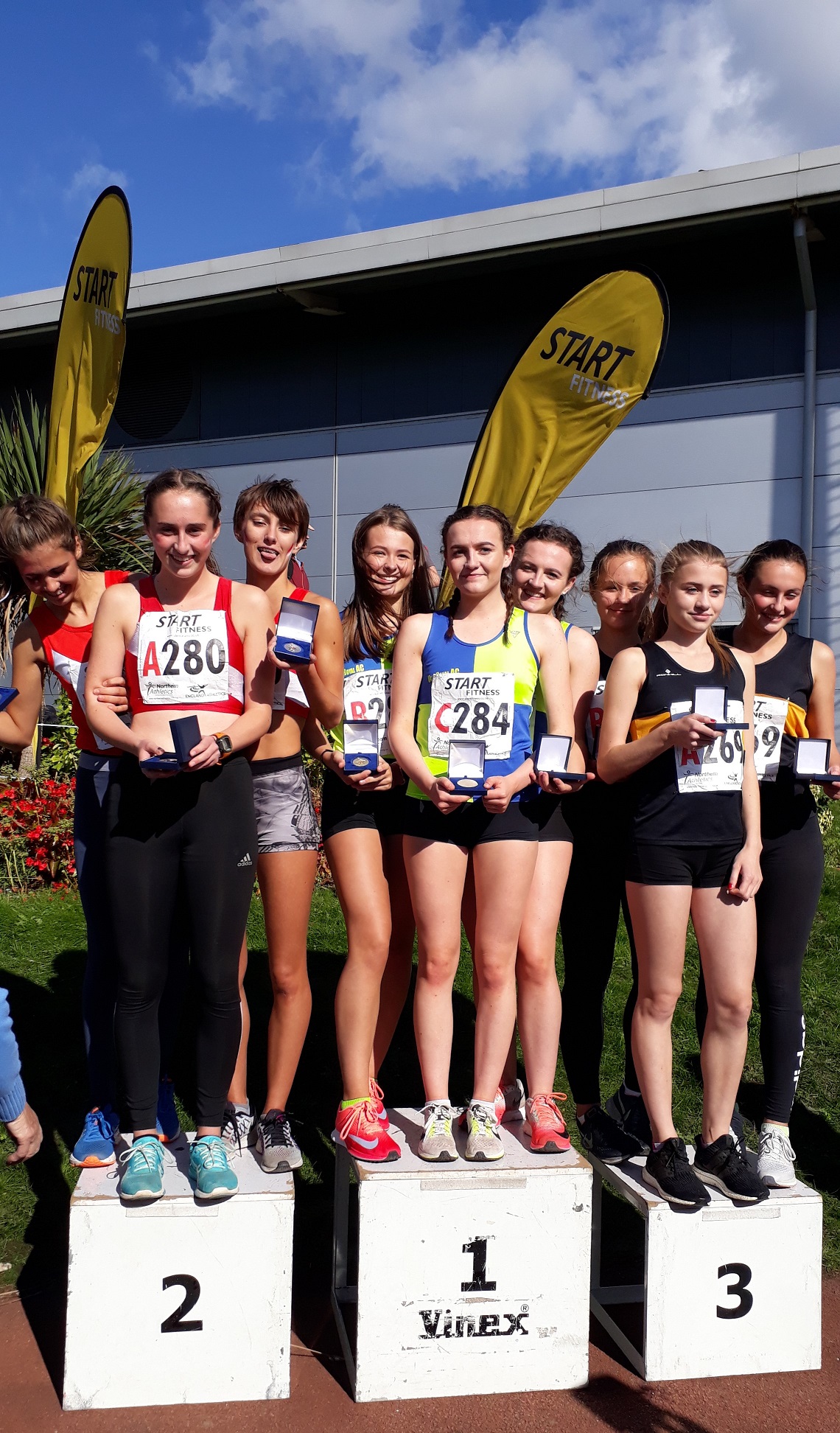 Presentation of under 17 women medal winners at NA road relays 2018